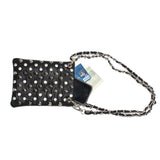 Black studded clutch bag with a chain strap on a white background